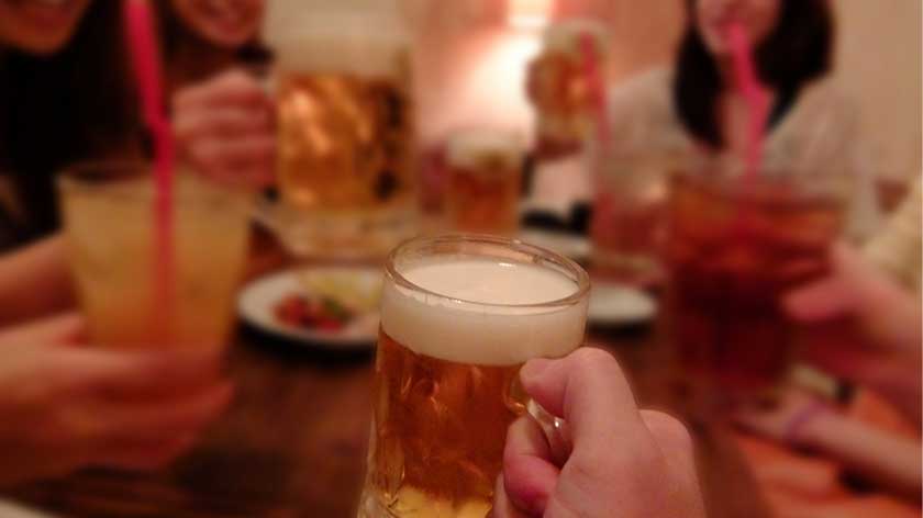 Japanese group drinking in pub