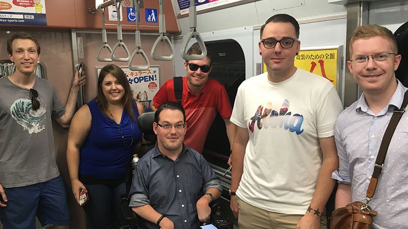 Inside Japan Tour Guides with Accessible Japan's Josh Grisdale on a train