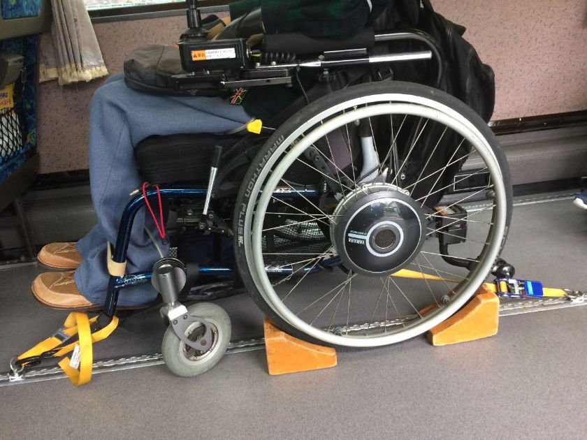Accessible airport bus wheelchair straps