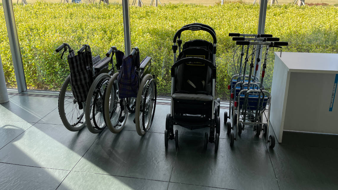 Wheelchairs and walkers at entrance